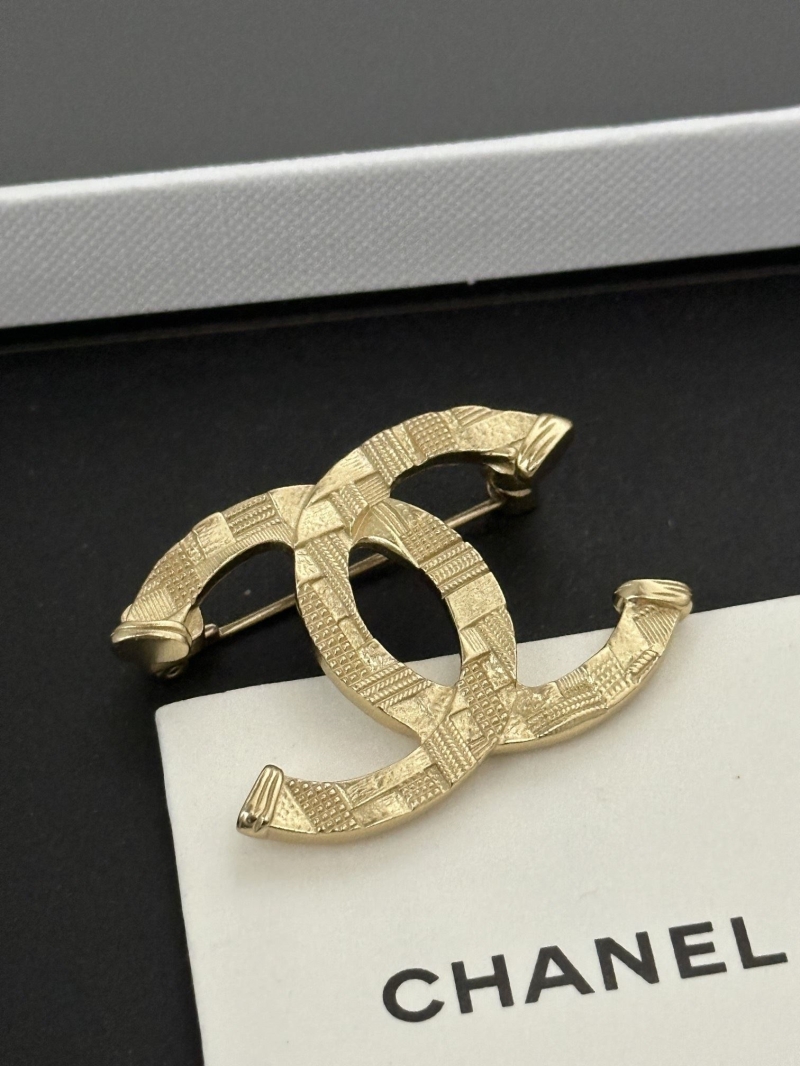 Ch**el brooches